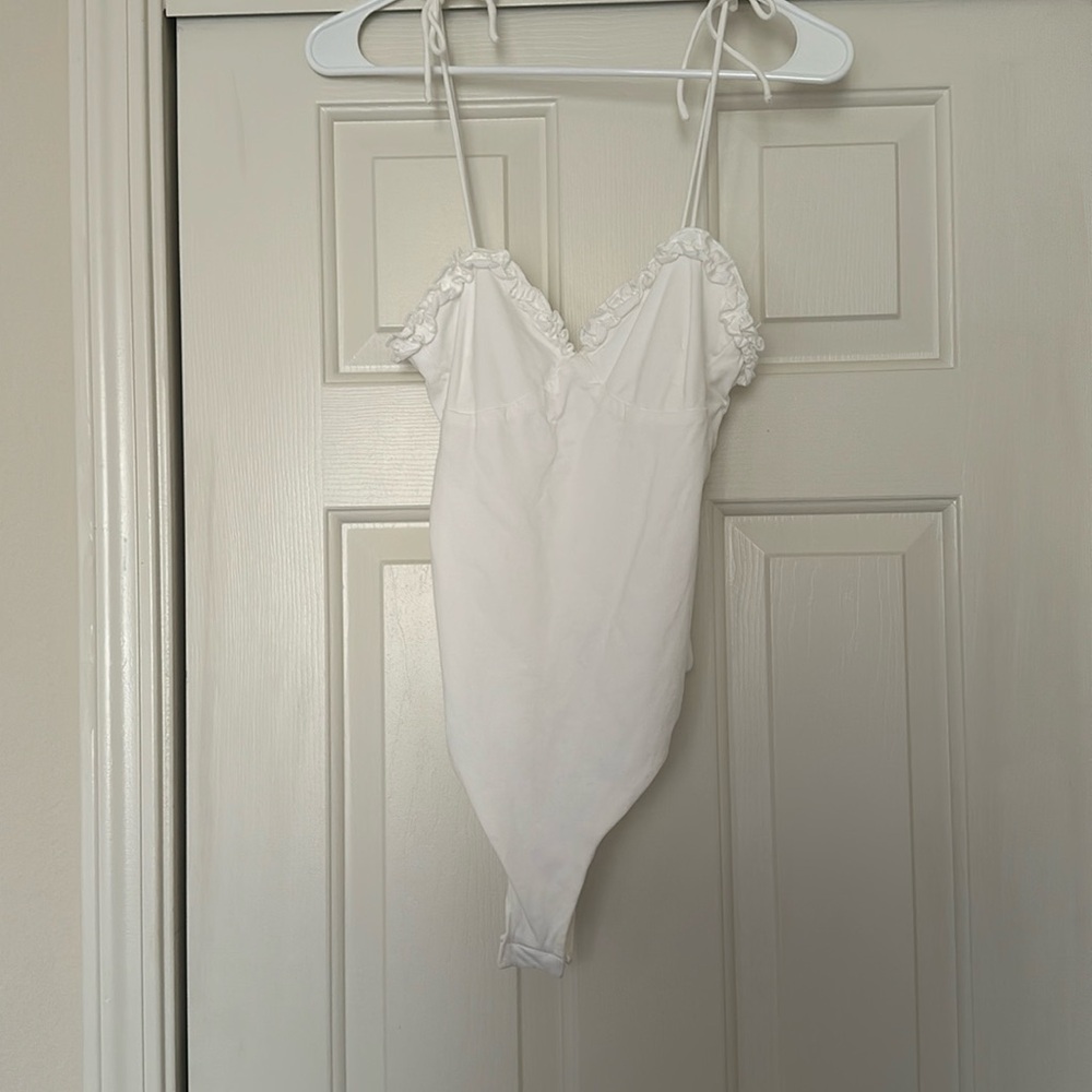 Small white bodysuit from super down